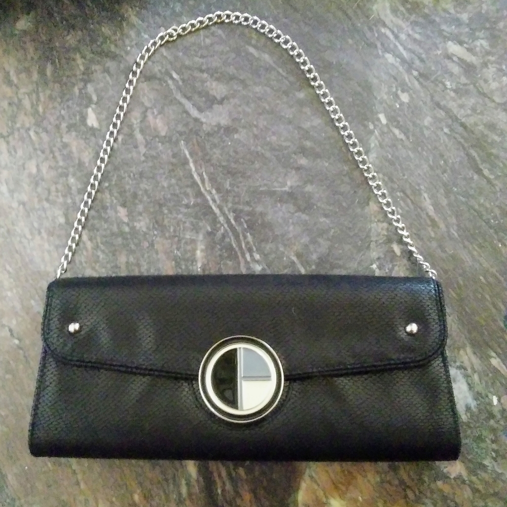 White House Black Market Clutch with dust bag.
